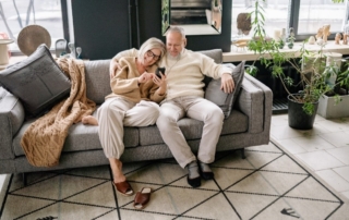 A cople in their 60s realizing they want to keep the home after it has been decluttered