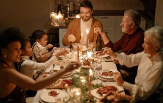 Family enjoying a holiday dinner after decluttering