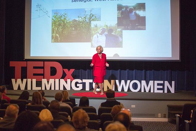 Rita Wilkings speaking about decluttering and minimalism at a TEDx Ted Talk event