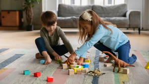 An image of kids playing with their toys in the living room. 