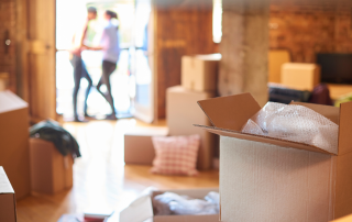 An image of a baby boomer downsizing to a smaller home that fits their new lifestyle as a minimalist.