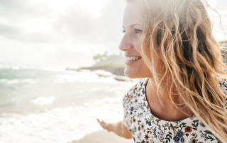 An image of a baby boomer woman who is living a simpler and minimalist life after decluttering and downsizing.