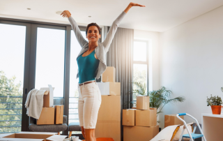 An image of a woman who has successfully downsized and decluttered her life for a minimalist lifestyle.