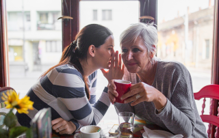 An image of a woman and a mother who are talking about the good, the bad, and the ugly things about downsizing and decluttering.